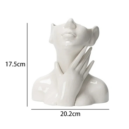 Wazon ceramiczny z motywem ludzkiej twarzy