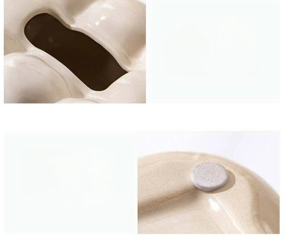 Ceramiczny stojak na chusteczki w kształcie muszelki