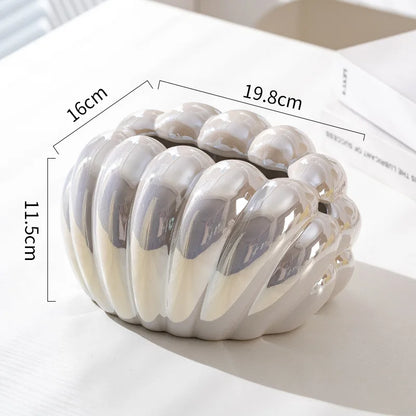 Ceramiczny stojak na chusteczki w kształcie muszelki